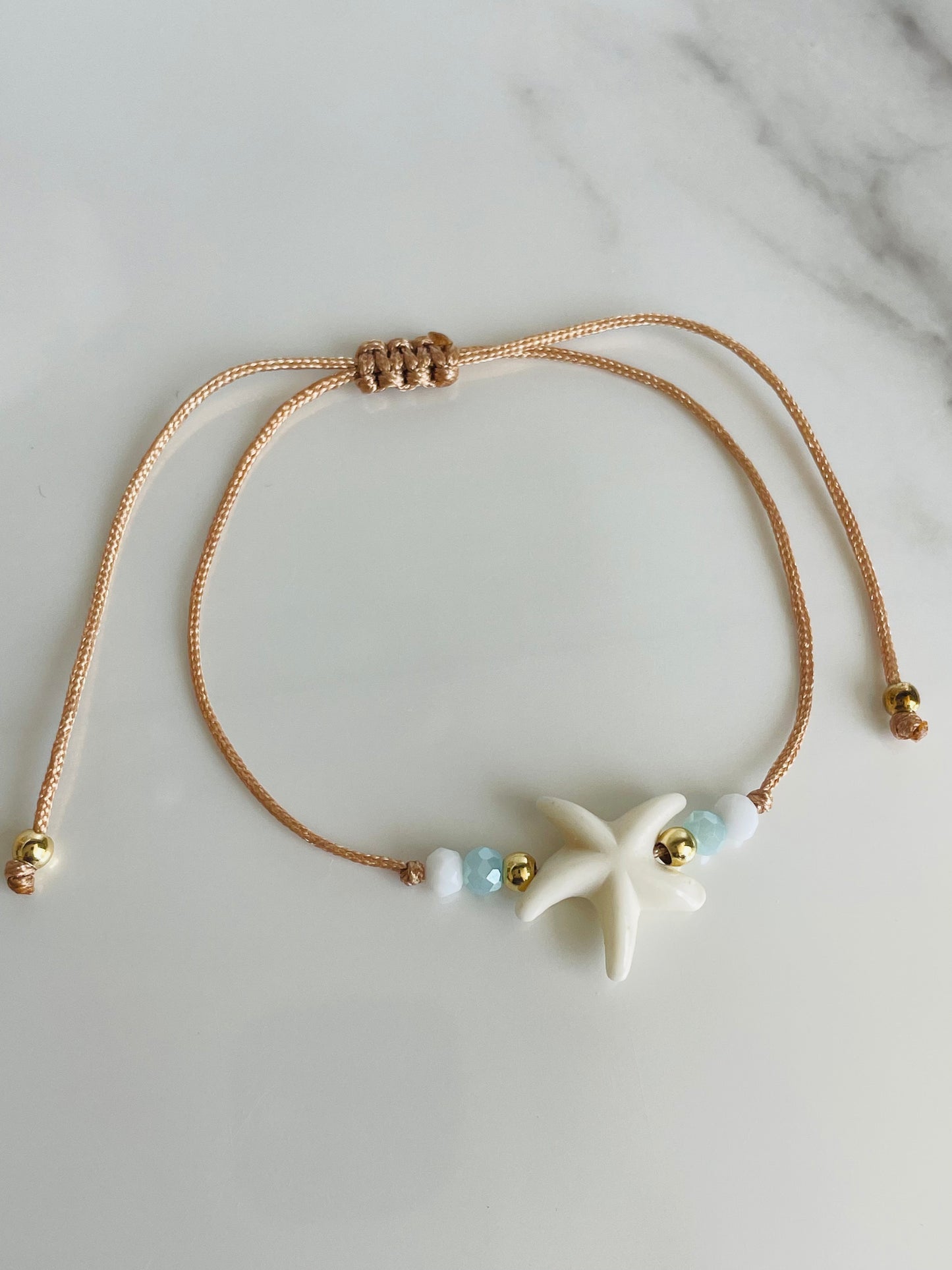 Pulsera hilo estrella mar dos