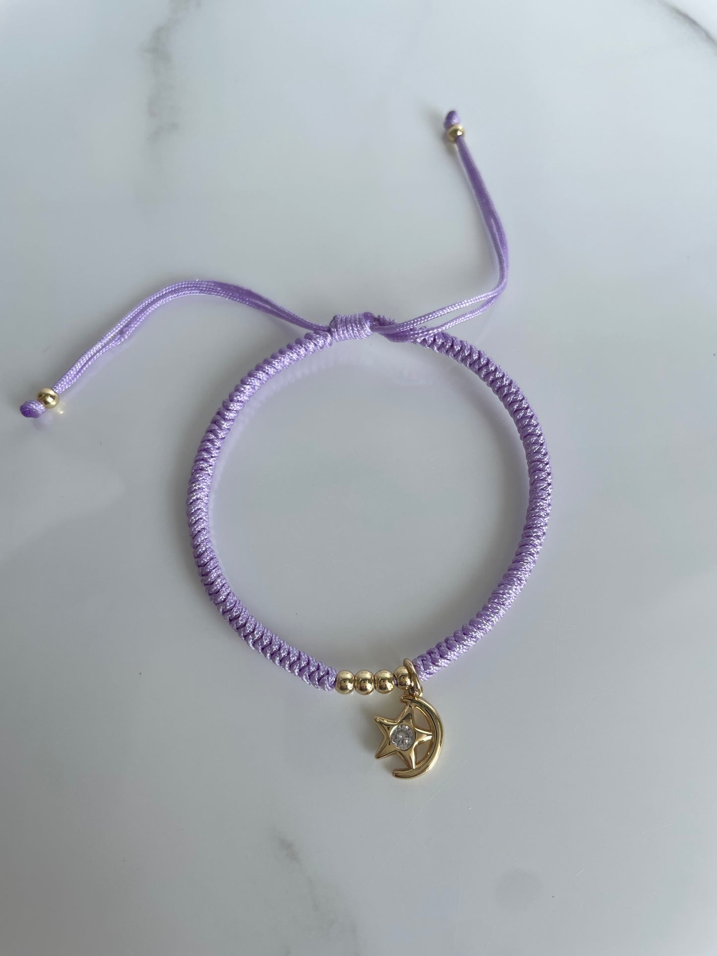 Pulsera tejida lila estrella luna