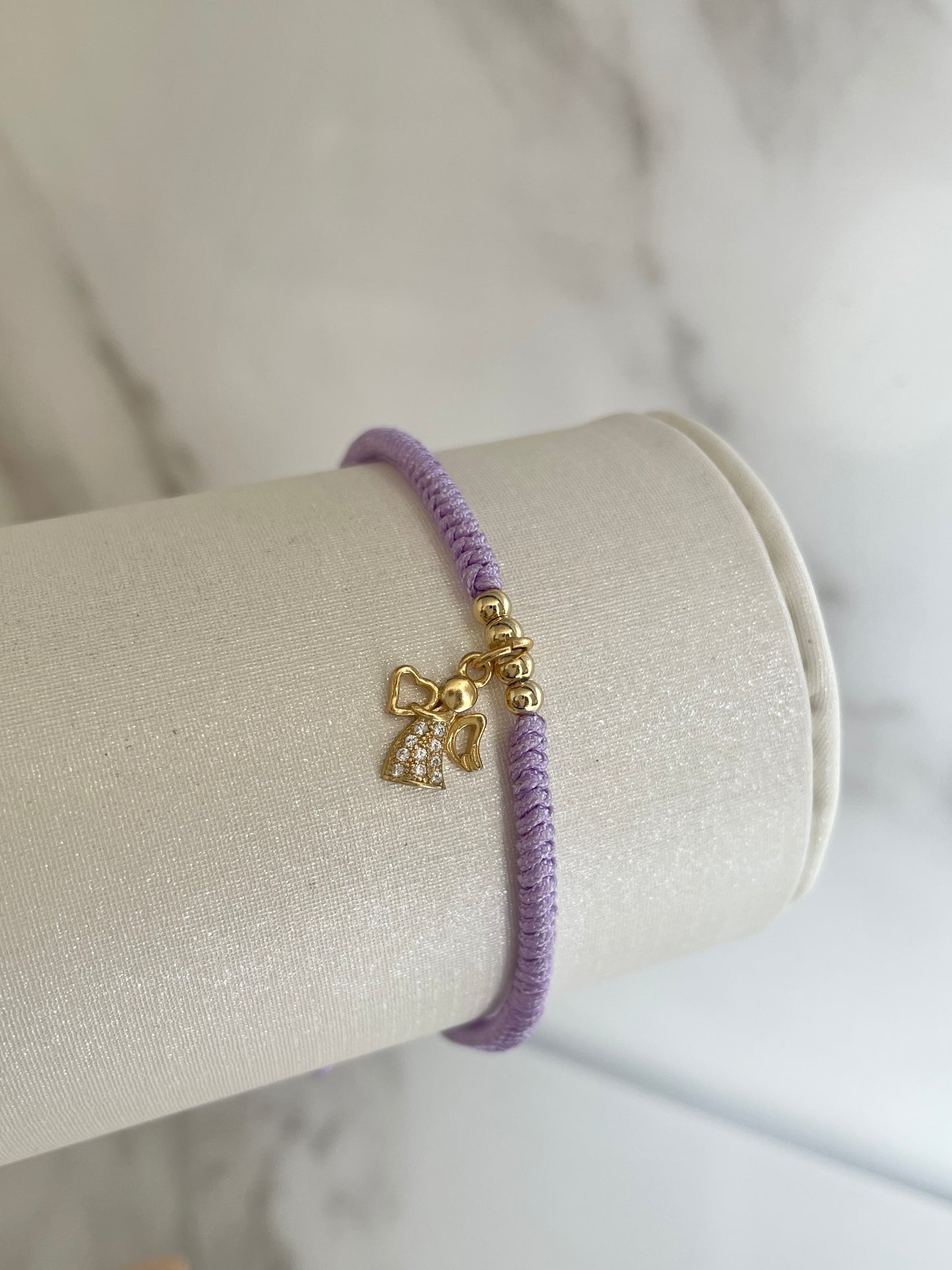 Pulsera tejida lila  ángel