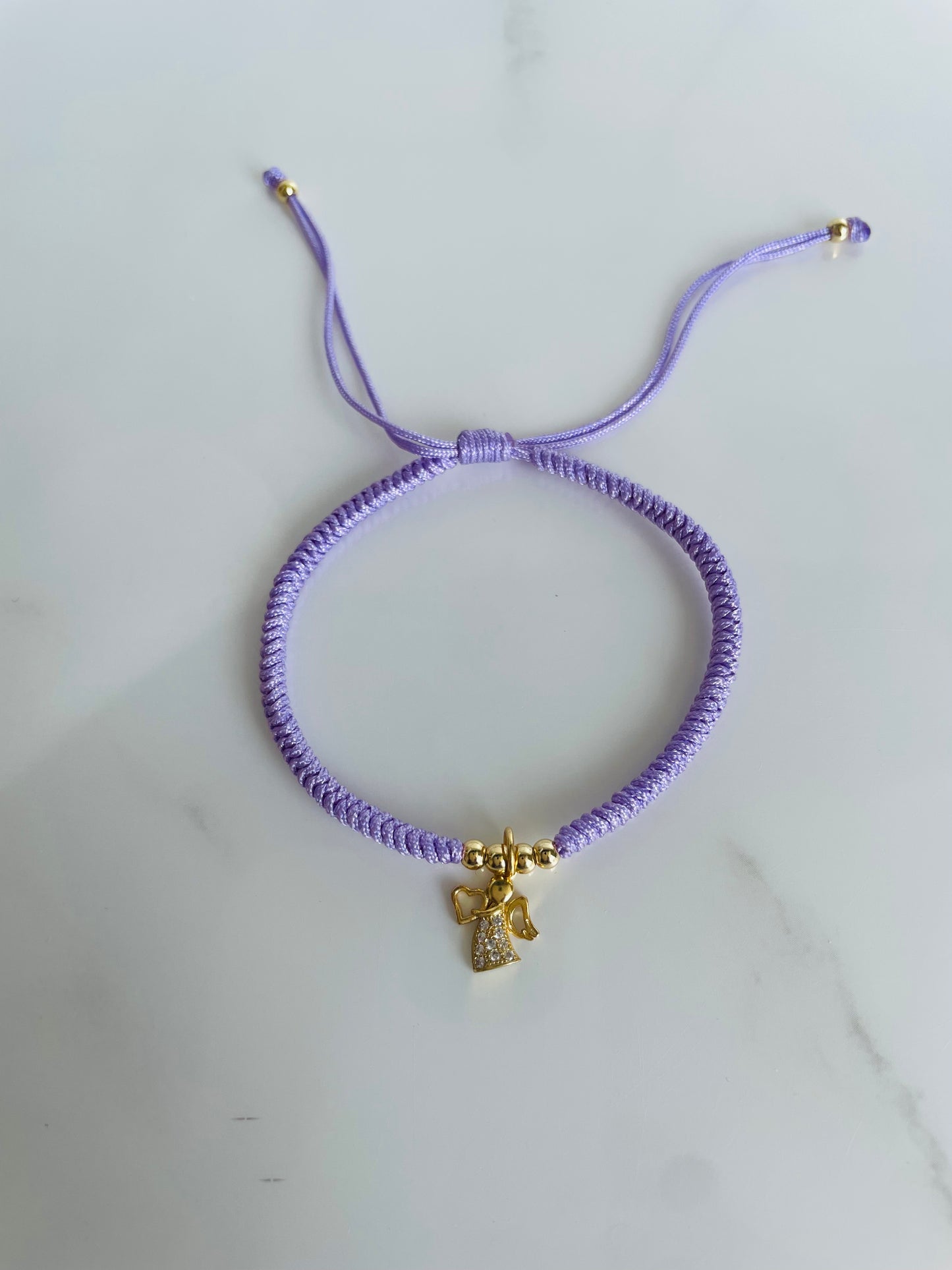 Pulsera tejida lila  ángel