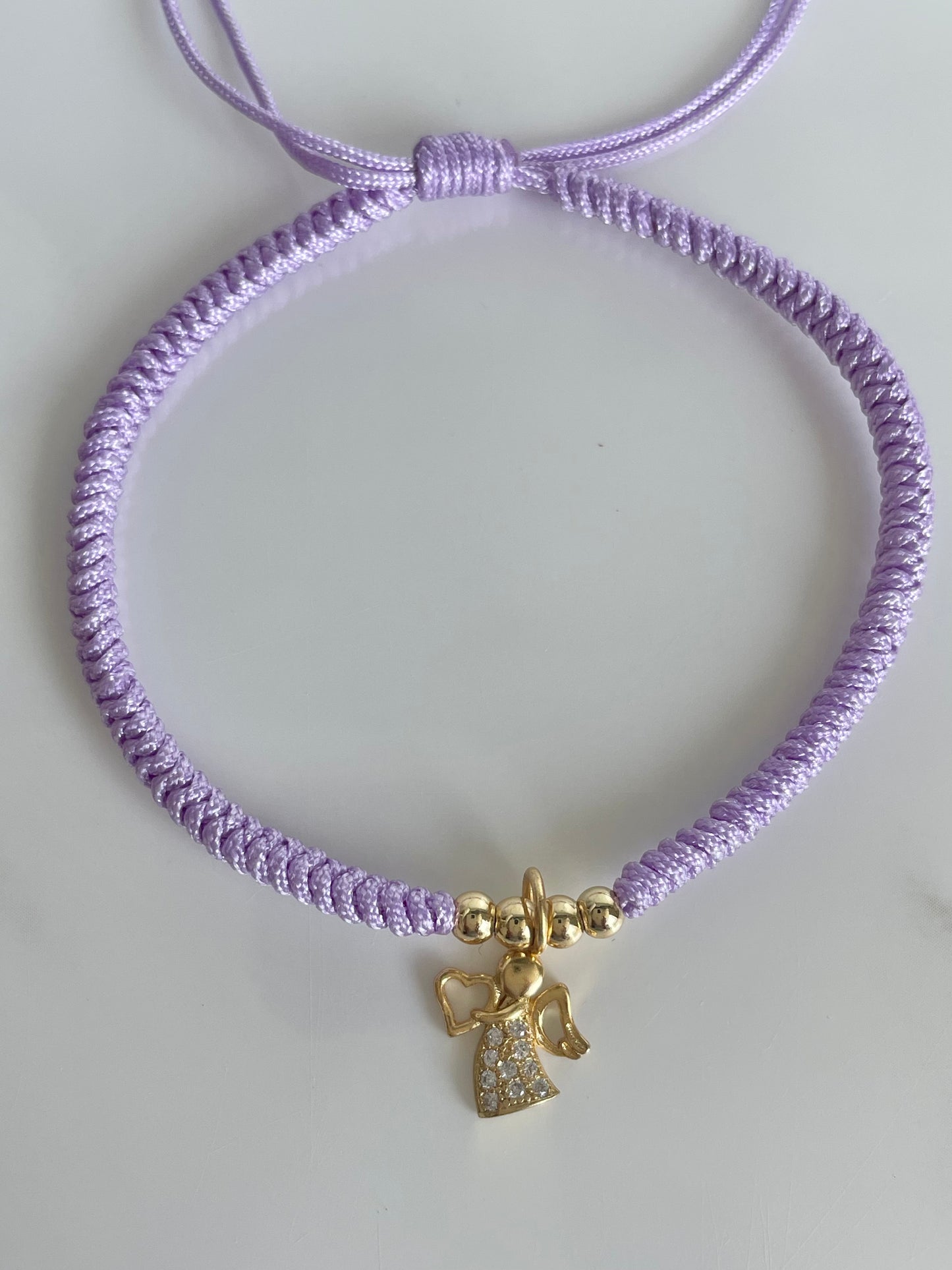 Pulsera tejida lila  ángel