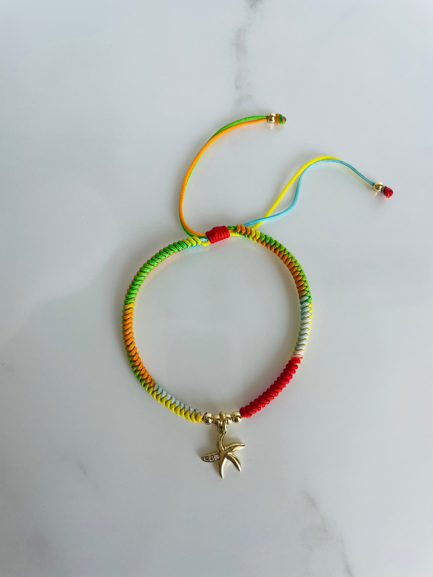 Pulsera tejida citrica, estrella