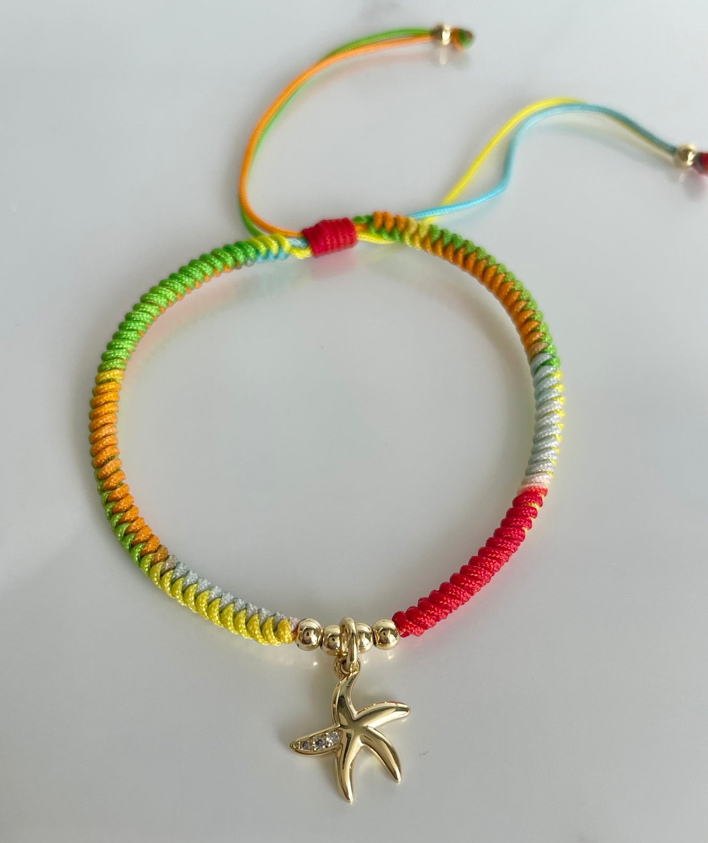 Pulsera tejida citrica, estrella